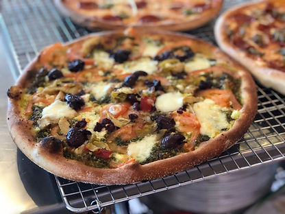 Wood-fired pesto pizza